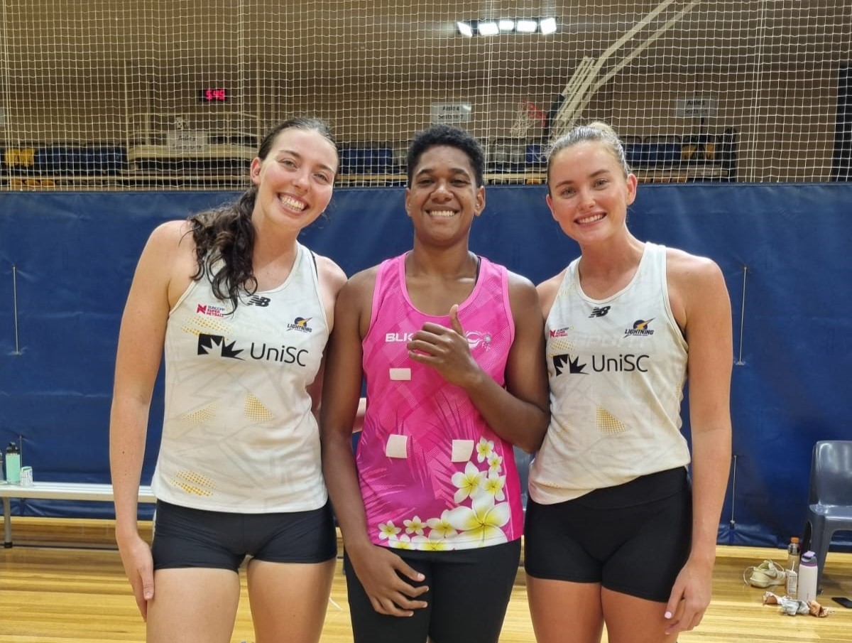 Lightning players Ashleigh Ervin and Reiley Batcheldor with Fiji Baby Pearl Frances Vula 